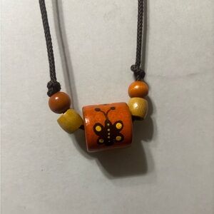 Butterfly Beaded Necklace with Orange Pendant